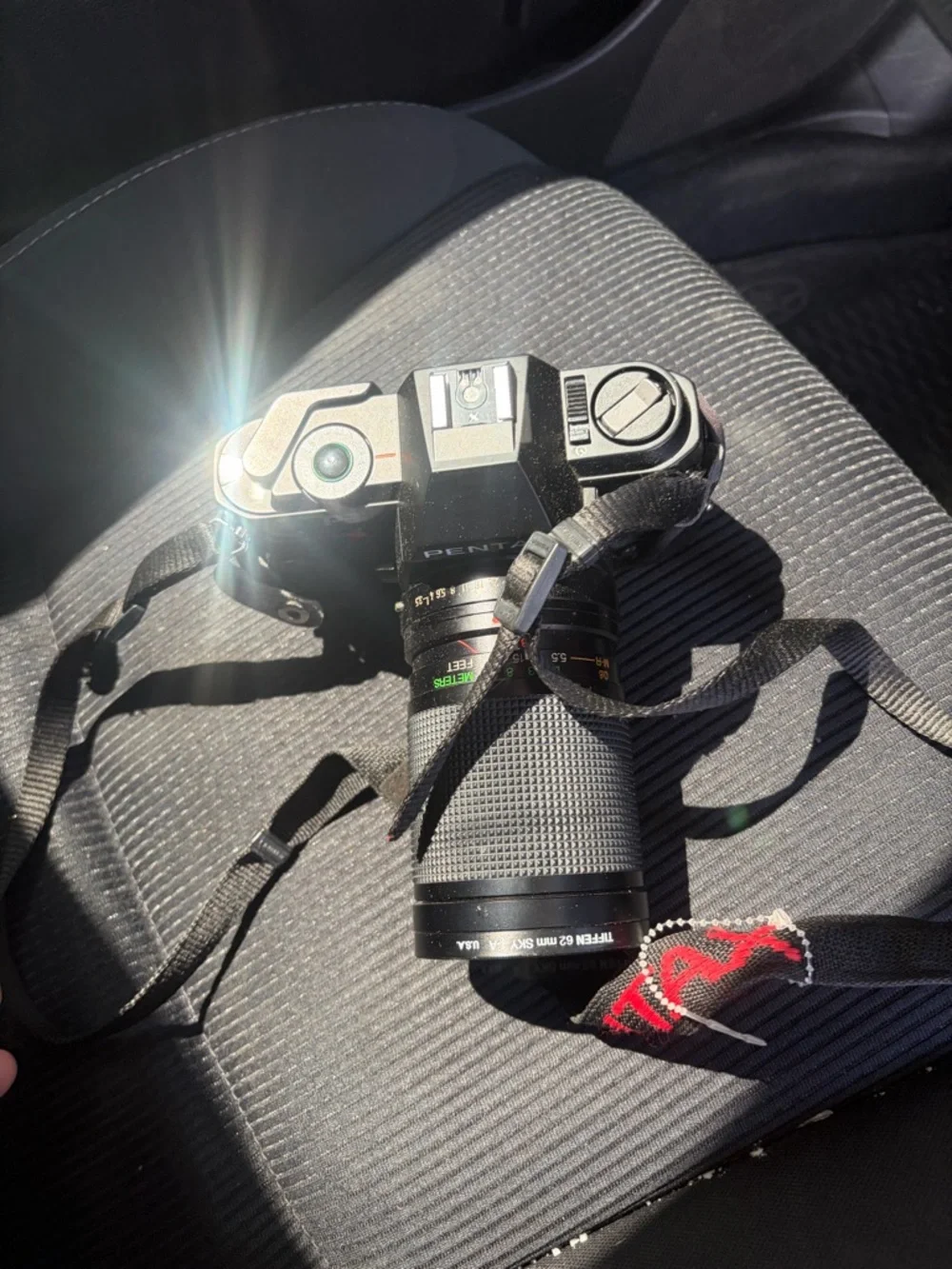 Pentax Black SLR Camera with Telephoto Lens